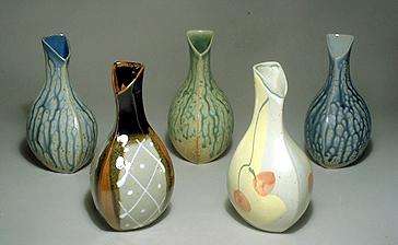  triangular bud vases